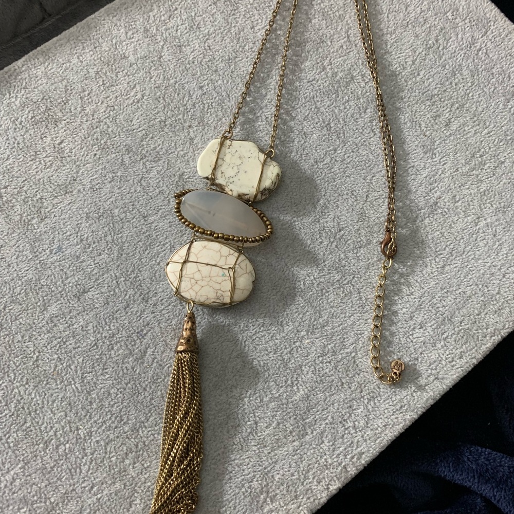 A long antique looking with stones long necklace. Pre-owned